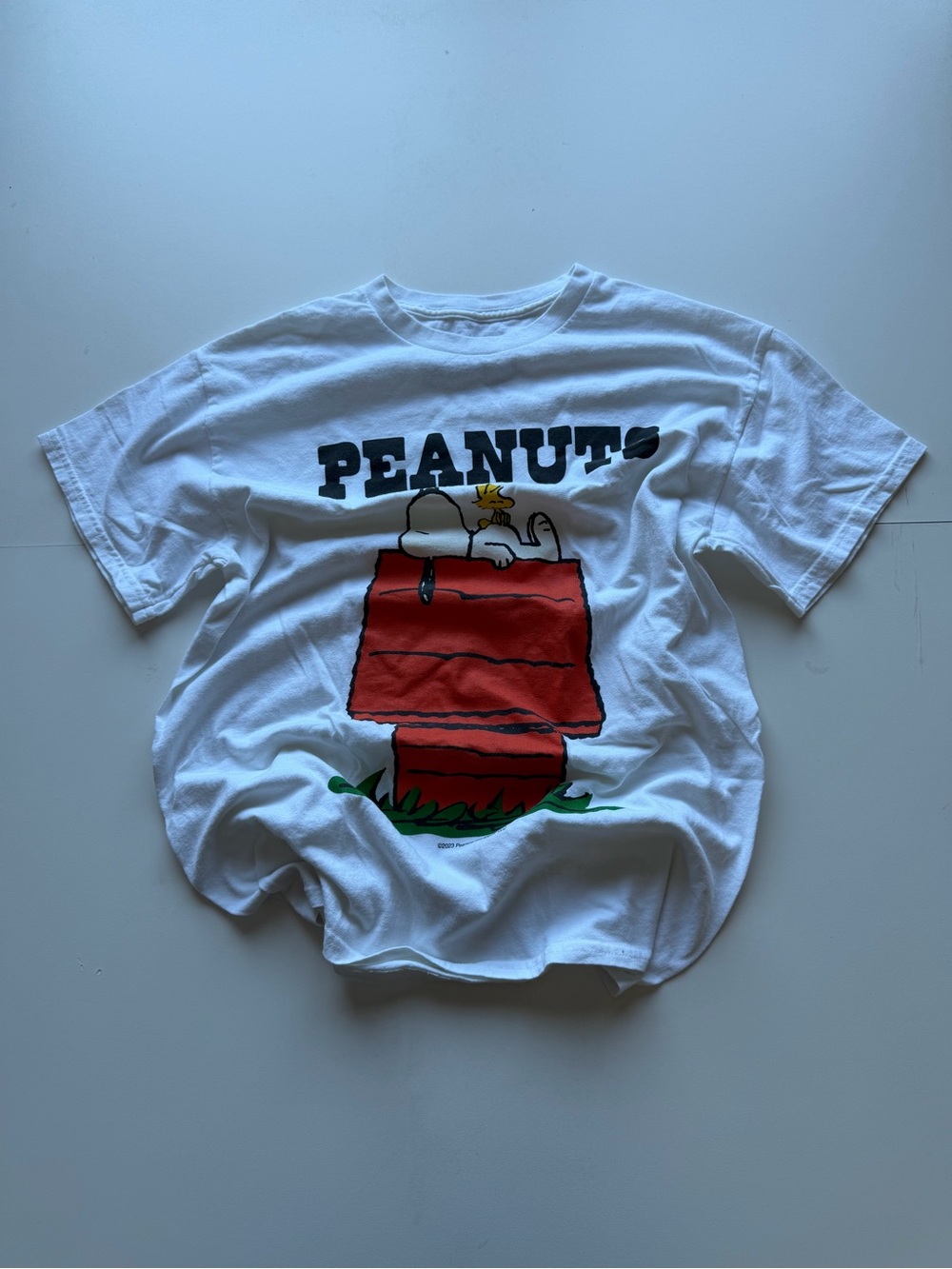 Peanuts White Tee with Snoopy on Red Doghouse - Peanuts